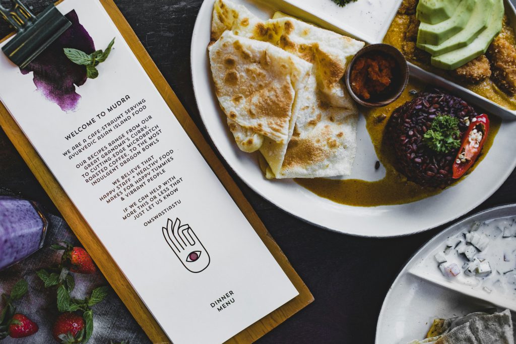 A restaurant menu featuring plant-based food and vegetarian luncheon meat options